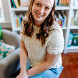 Woman confidently wearing the Lavender Library Lover headband for cute hairstyles and comfortable all-day wear.