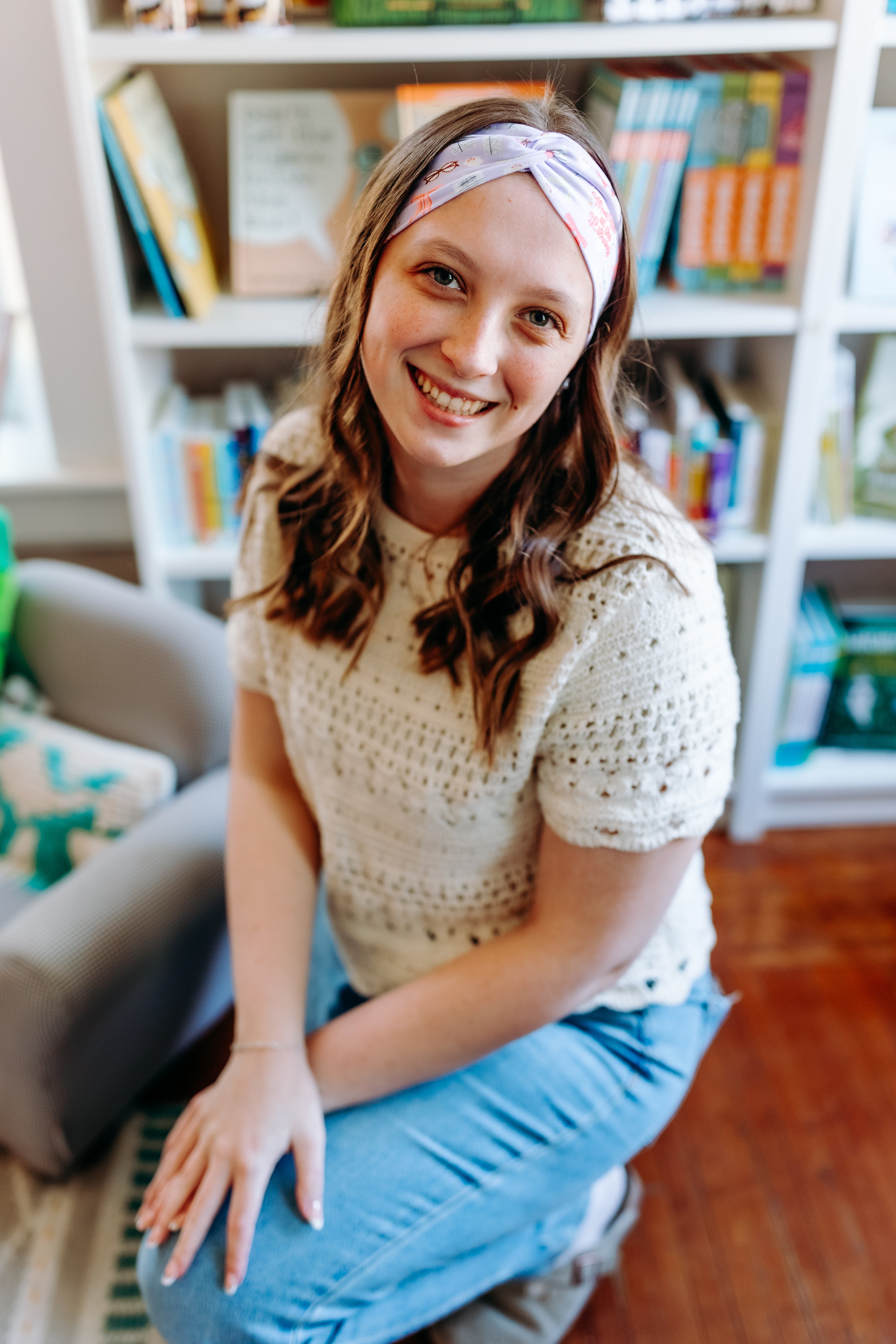 Woman confidently wearing the Lavender Library Lover headband for cute hairstyles and comfortable all-day wear.