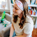 Woman confidently wearing the Lavender Library Lover headband for cute hairstyles and comfortable all-day wear.