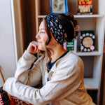 Woman confidently wearing the Bloom & Blaze headband for cute hairstyles and comfortable all-day wear.