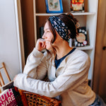 Woman confidently wearing the Bloom & Blaze headband for cute hairstyles and comfortable all-day wear.