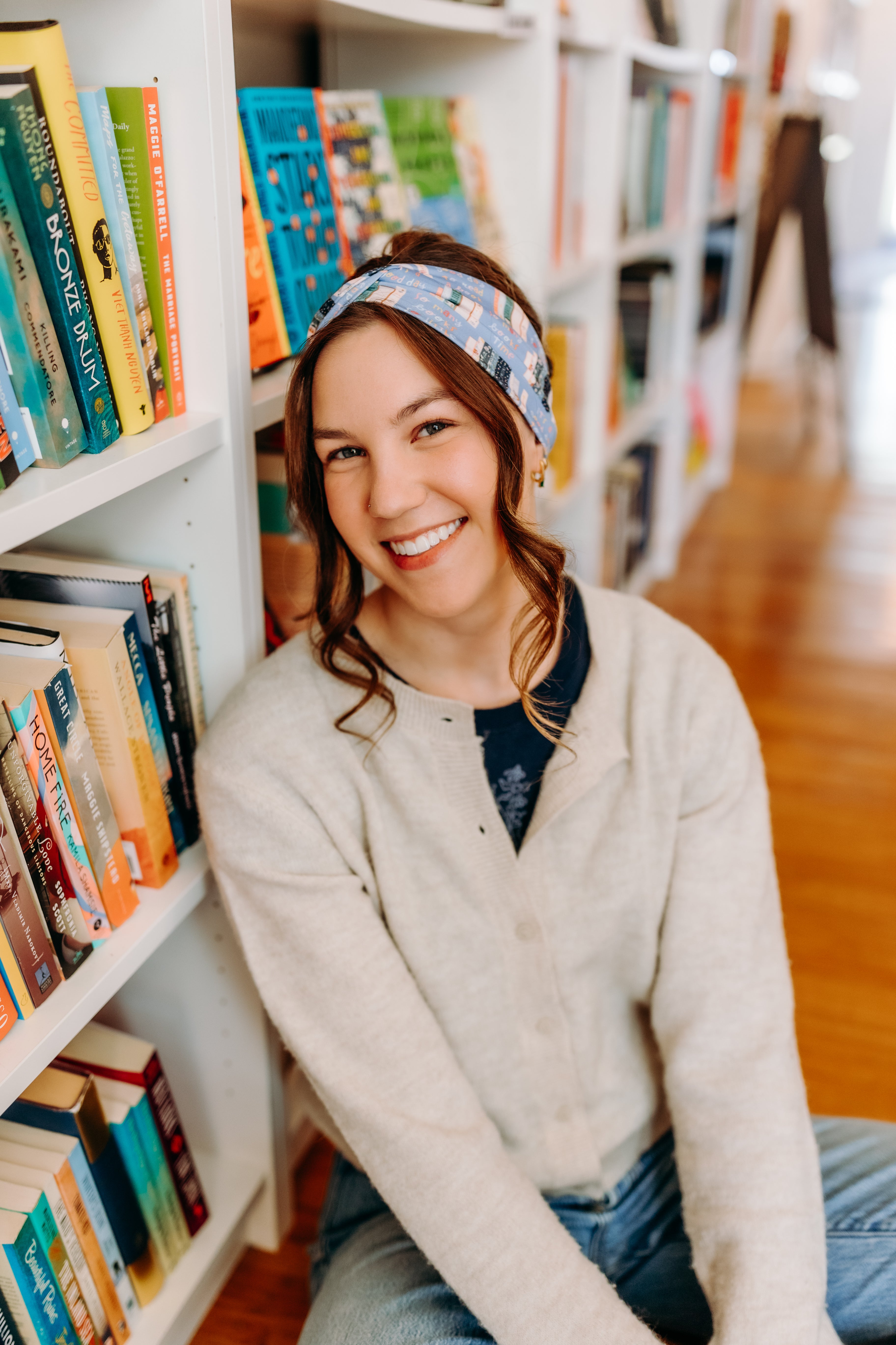 Woman confidently wearing the Fully Booked headband for cute hairstyles and comfortable all-day wear.