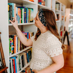 Woman confidently wearing the Bloom & Blaze headband for cute hairstyles and comfortable all-day wear.