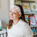 Woman confidently wearing the Pretty Pages headband for cute hairstyles and comfortable all-day wear.