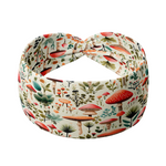 An Enchanted Garden headband with a mushroom and plant pattern, featuring a knot design. Versatile 3-in-1 twist style, sweat-absorbent, non-slip, and machine washable. Functional and stylish for any activity.