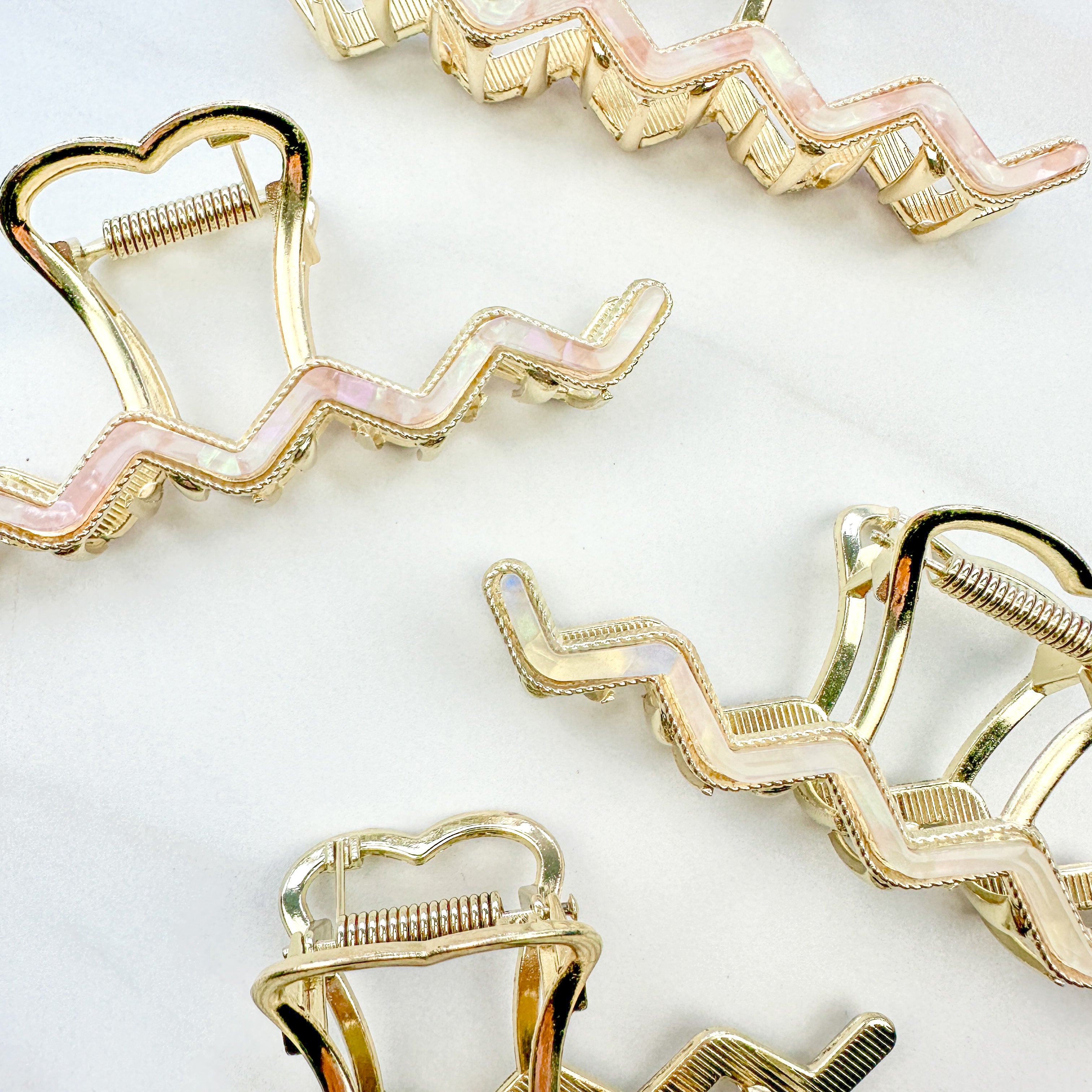 New York Minute: A 4.2-inch metal hair clip with a hinge closure, part of the Sarah Wallace Collection.