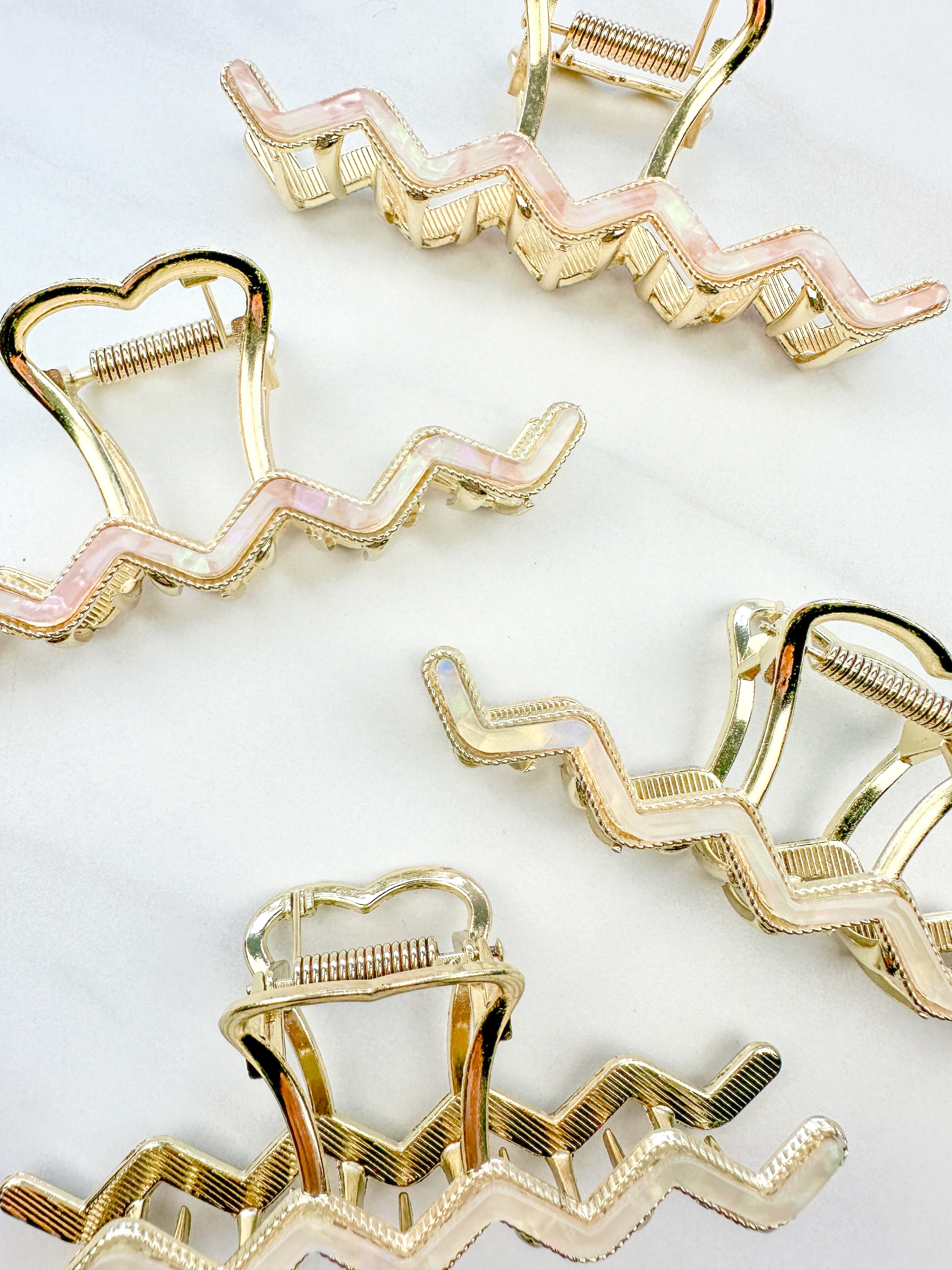 New York Minute: A 4.2-inch metal hair clip with a hinge closure, part of the Sarah Wallace Collection.