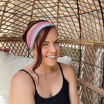 Adult women's headband with orange, purple, yellow, blue, green and red stripes and dots