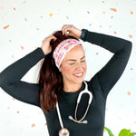 Birthday Specialist Lilac Market Headband worn by a woman with a stethoscope, showcasing a versatile 3-in-1 twist style for confidence and function.