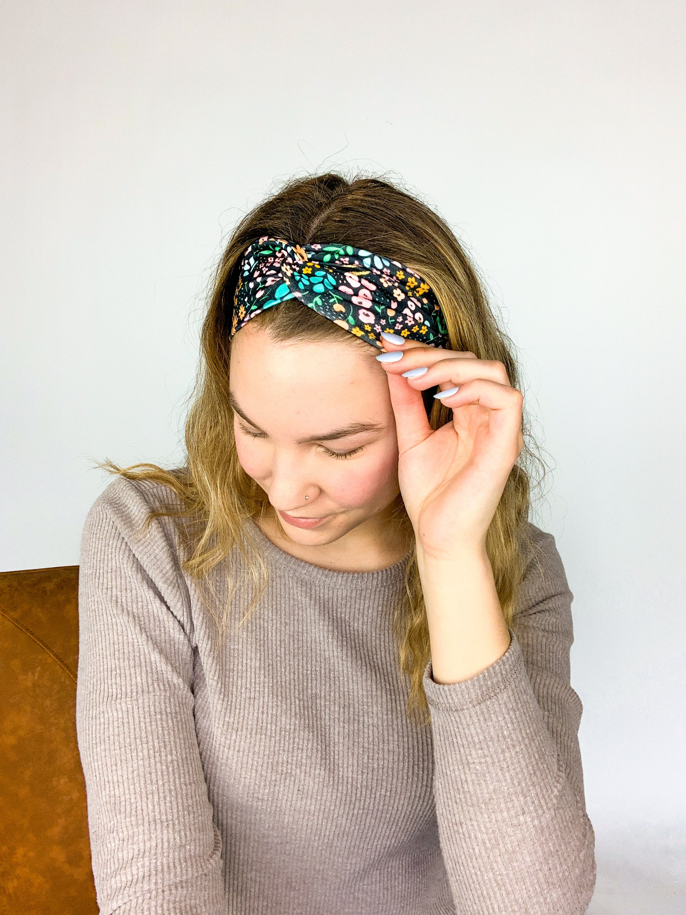 Adult women's black headband with mustard and pink flowers and green and teal greenery