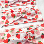 Adult women's light blush headband with pale pink and red strawberries