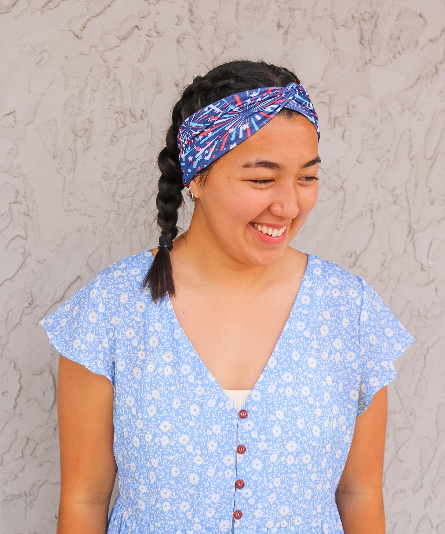 Adult women's navy headband with red, white and blue firework and star design