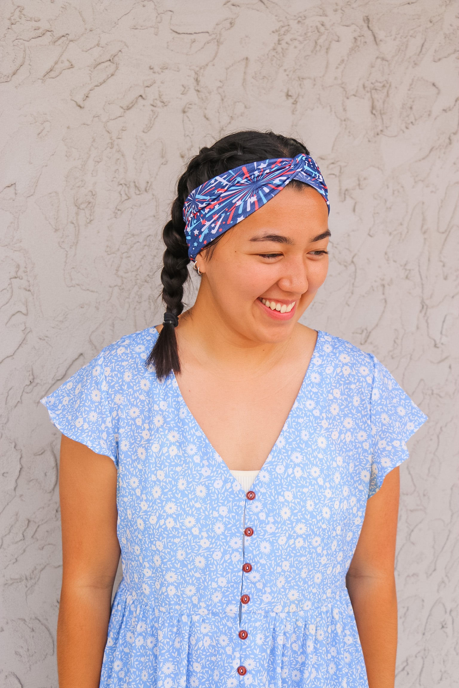Adult women's navy headband with red, white and blue firework and star design