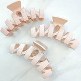 Hair claw clip in sage, mocha, tan or black in zig zag shape.