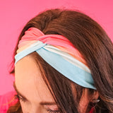 Adult women's wavy striped gradient headband from hot pink, orange, light blue and blue