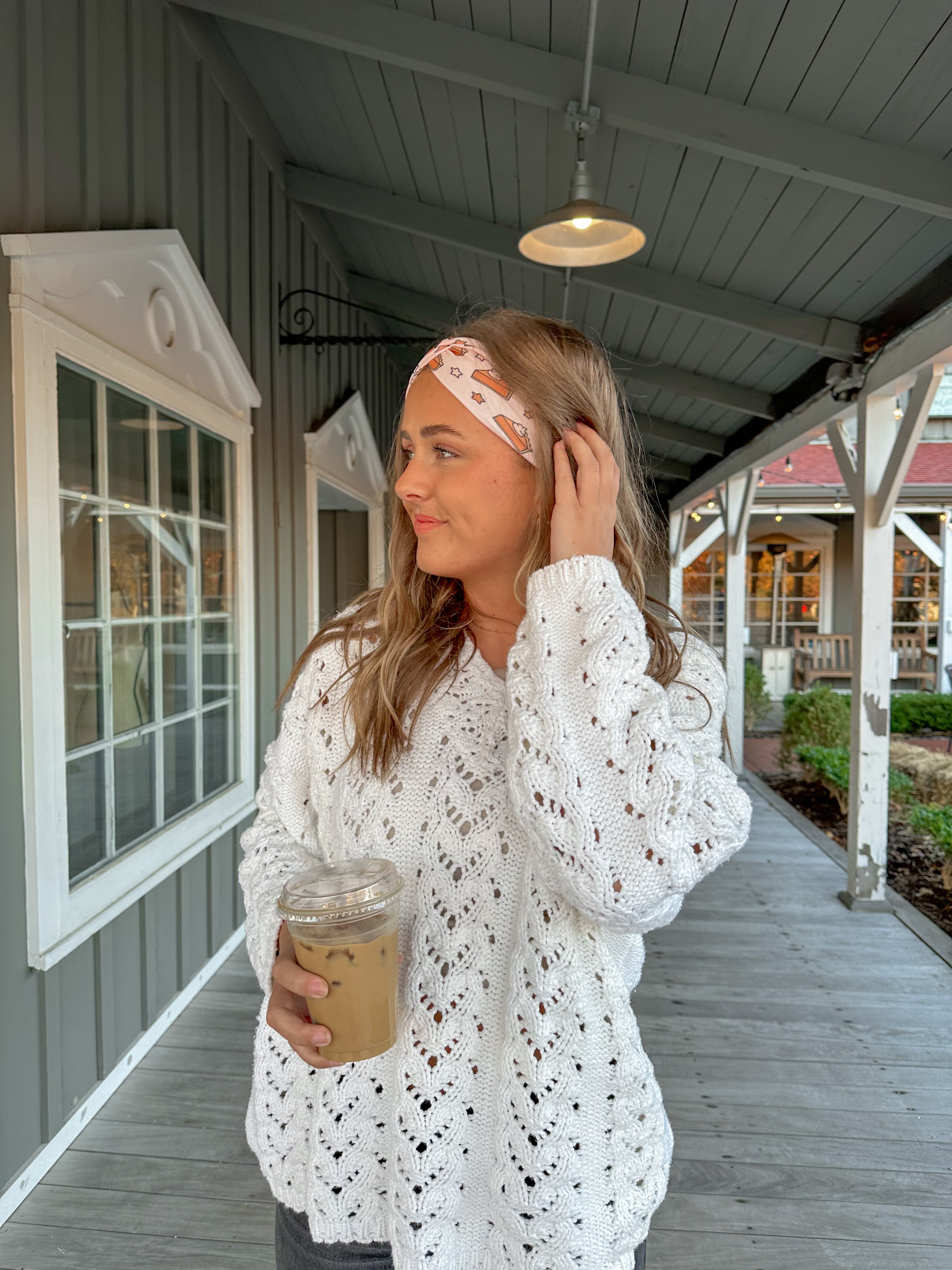 Adult women's blush headband with slices of pumpkin pie and whipped cream and yellow and brown stars