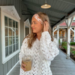 Adult women's blush headband with slices of pumpkin pie and whipped cream and yellow and brown stars
