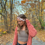 Adult women's tan headband with allover cartoon turkeys