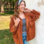 Woman smiling, wearing the Purranormal Activity headband from Lilac Market, featuring a versatile 3-in-1 twist style and buttery-soft, ultra-stretchy poly-knit blend.