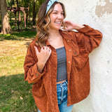 Woman smiling, wearing the Purranormal Activity headband from Lilac Market, featuring a versatile 3-in-1 twist style and buttery-soft, ultra-stretchy poly-knit blend.