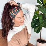 Adult women's black headband with red foxes, orange, green, red and ivory flowers and leaves