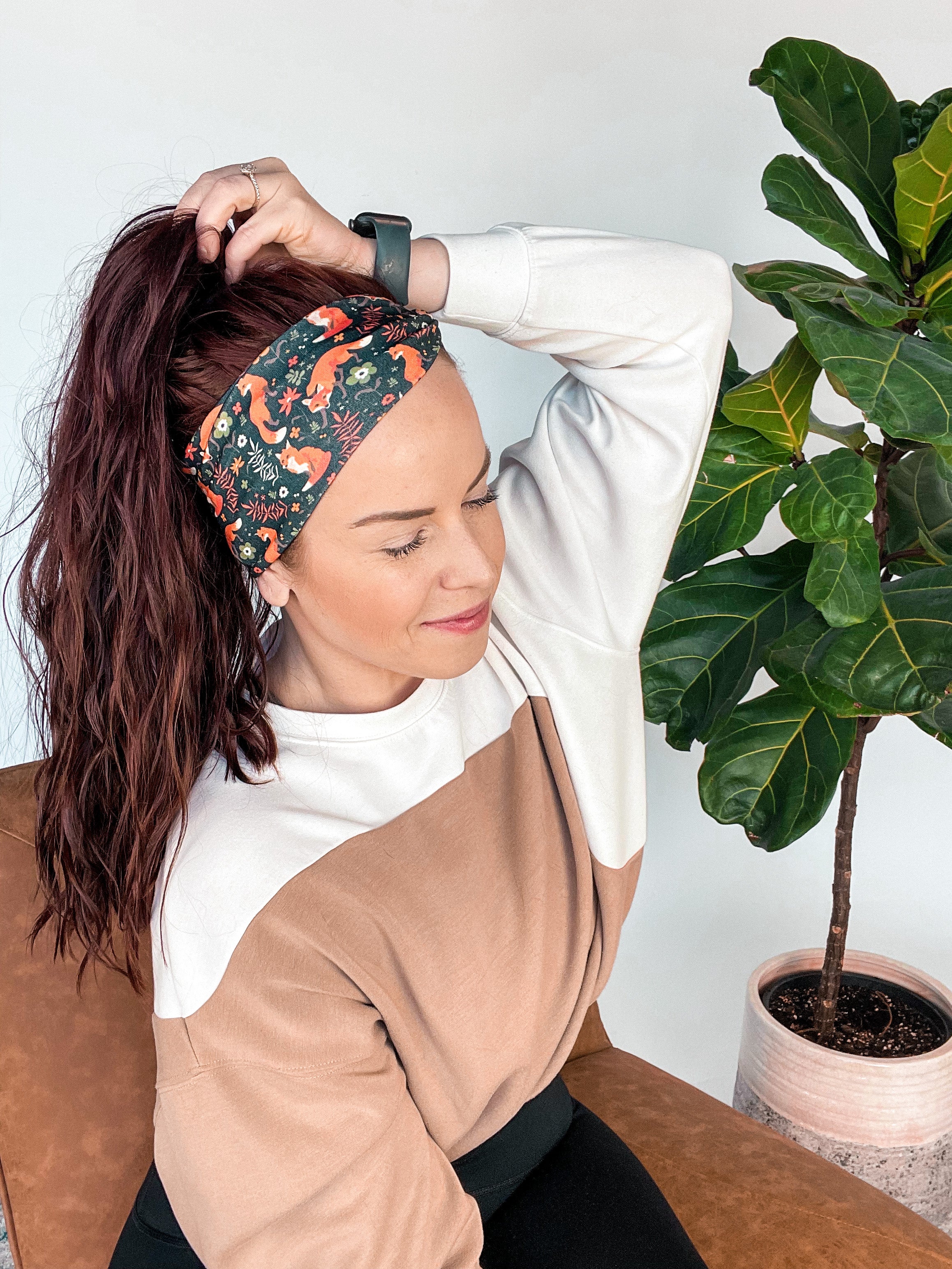 Adult women's black headband with red foxes, orange, green, red and ivory flowers and leaves