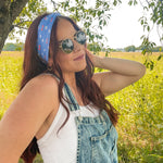Woman in sunglasses confidently wearing the Cherry on Top headband, designed for comfort, versatility, and functionality.