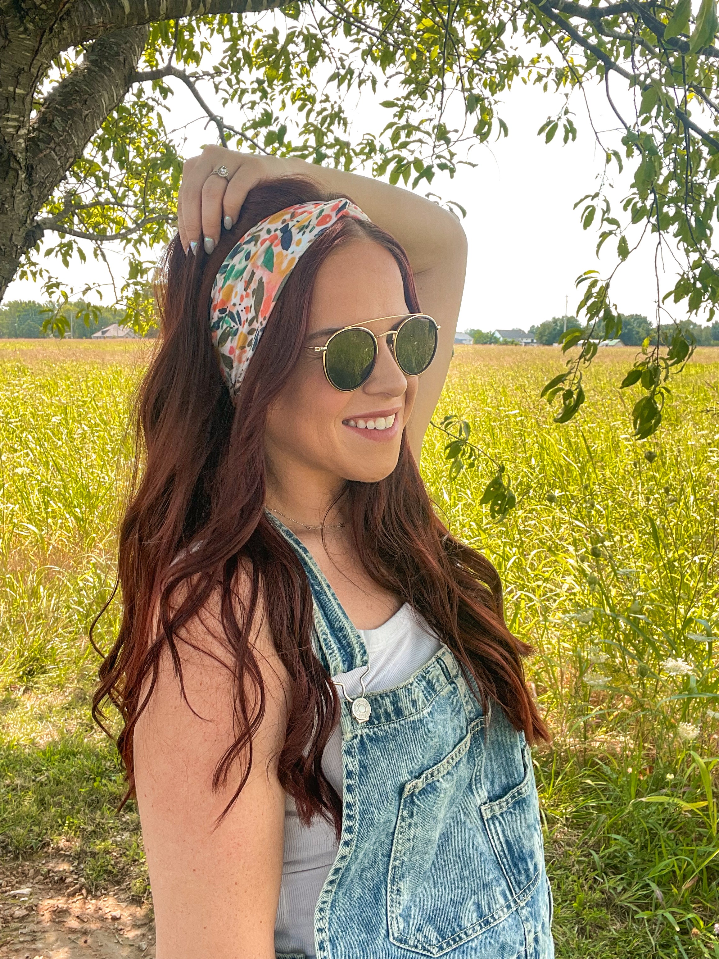 Woman confidently wearing the Simply the Zest headband, capturing its versatile 3-in-1 twist style, perfect for workouts or play.