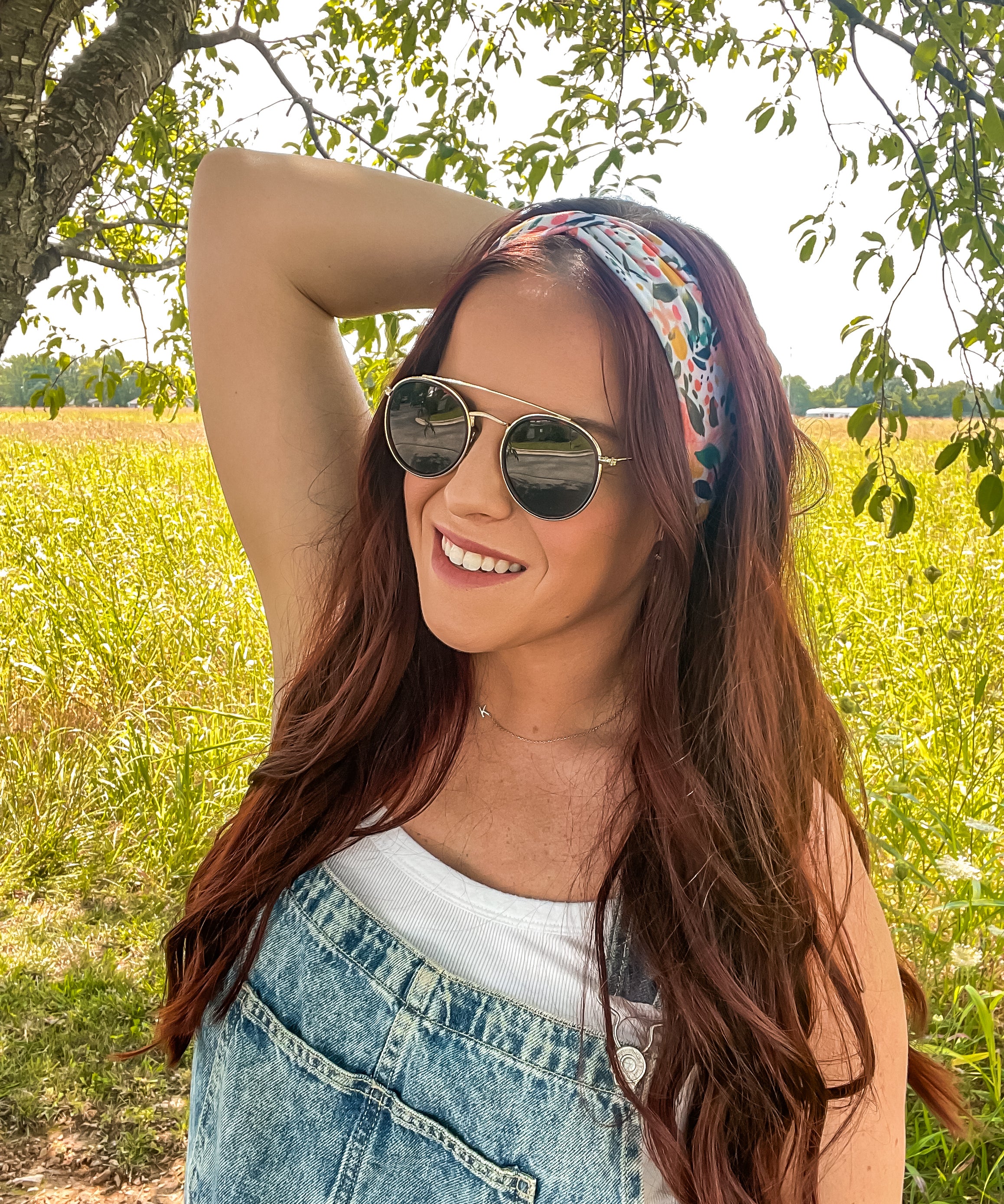 Woman confidently wearing the Simply the Zest headband, capturing its versatile 3-in-1 twist style, perfect for workouts or play.