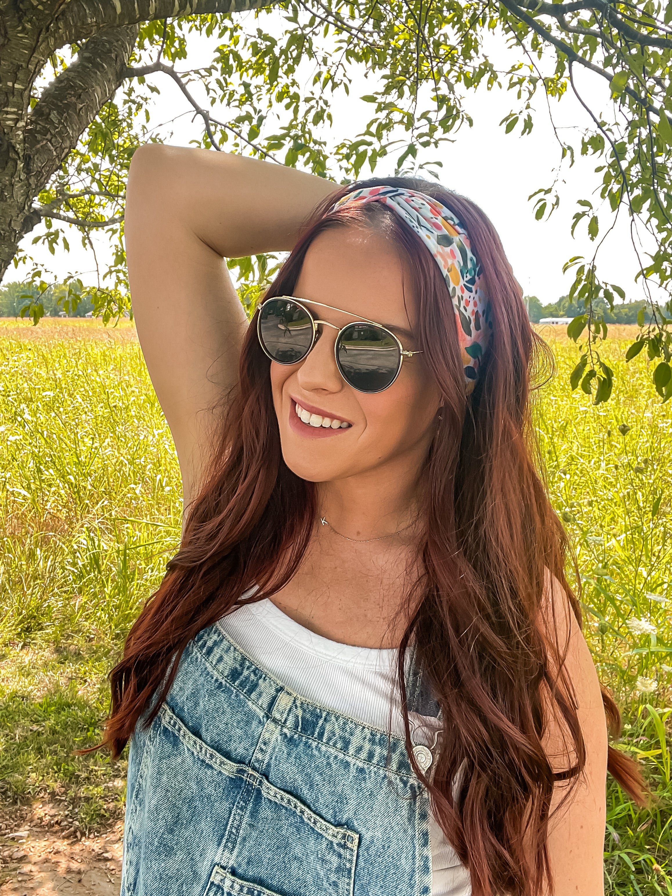 Woman confidently wearing the Simply the Zest headband, capturing its versatile 3-in-1 twist style, perfect for workouts or play.