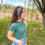 Woman confidently wearing the Woodland Wonder headband for easy hairstyles and comfortable wear.