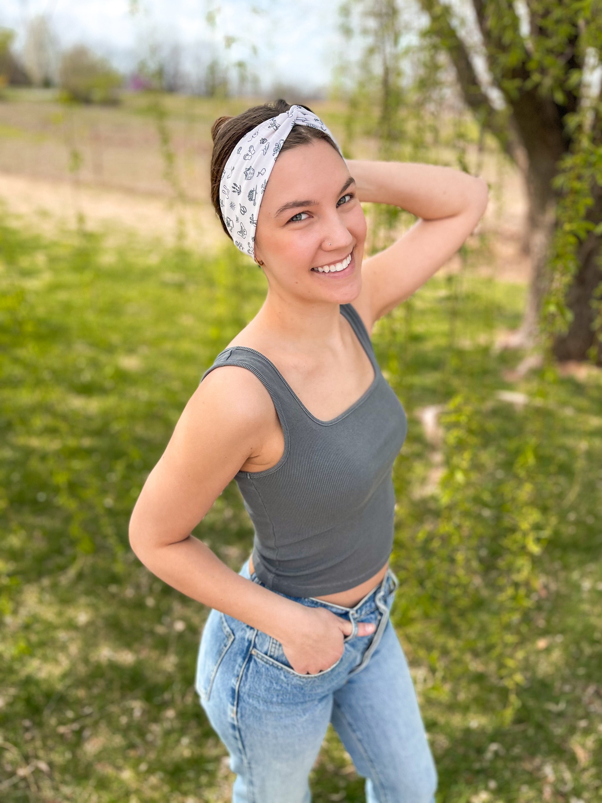 Woman confidently wearing the The Gardener headband for easy hairstyles and comfortable wear.