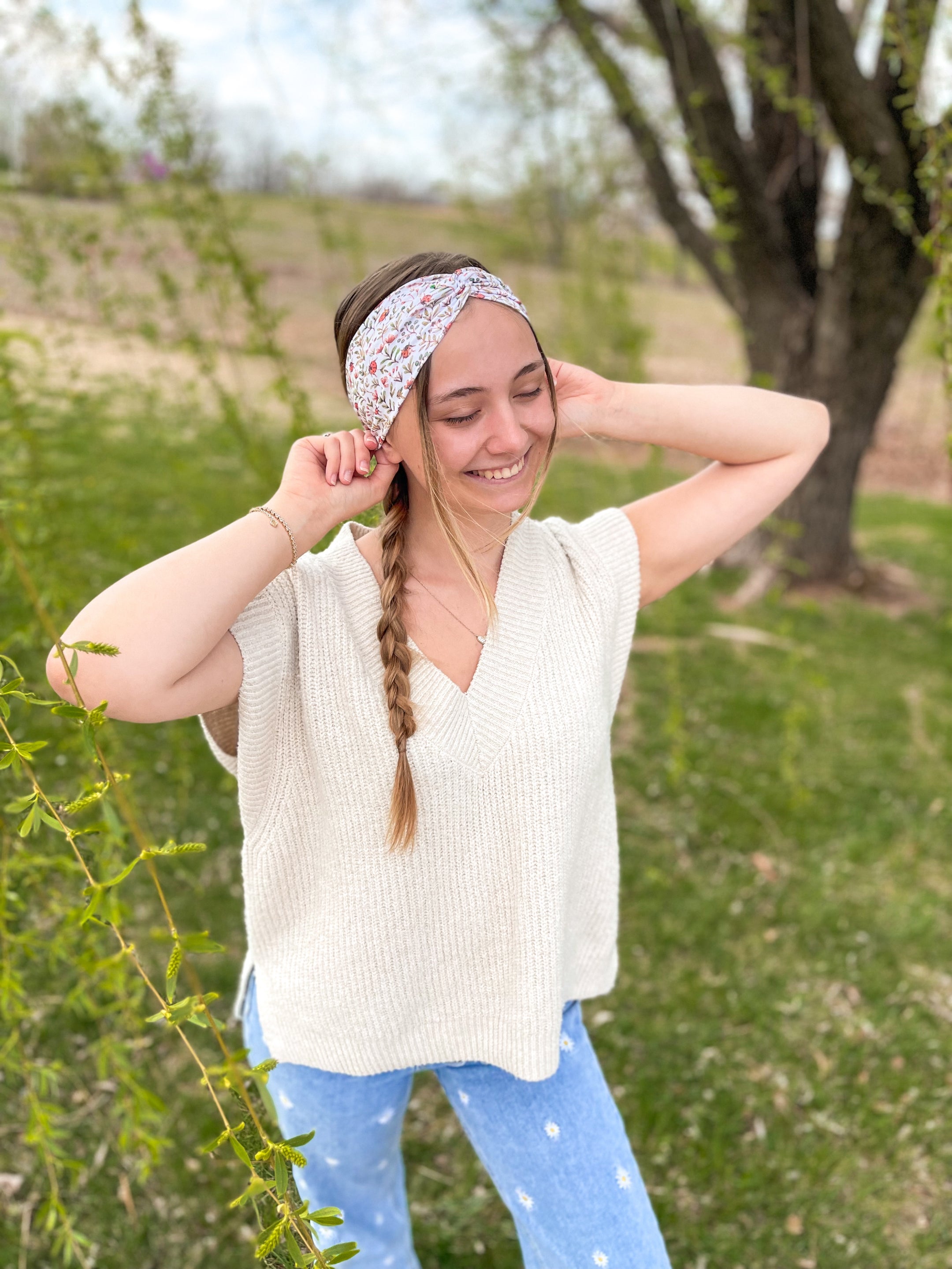 Woman confidently wearing the Lovebug headband for easy hairstyles and comfortable wear.