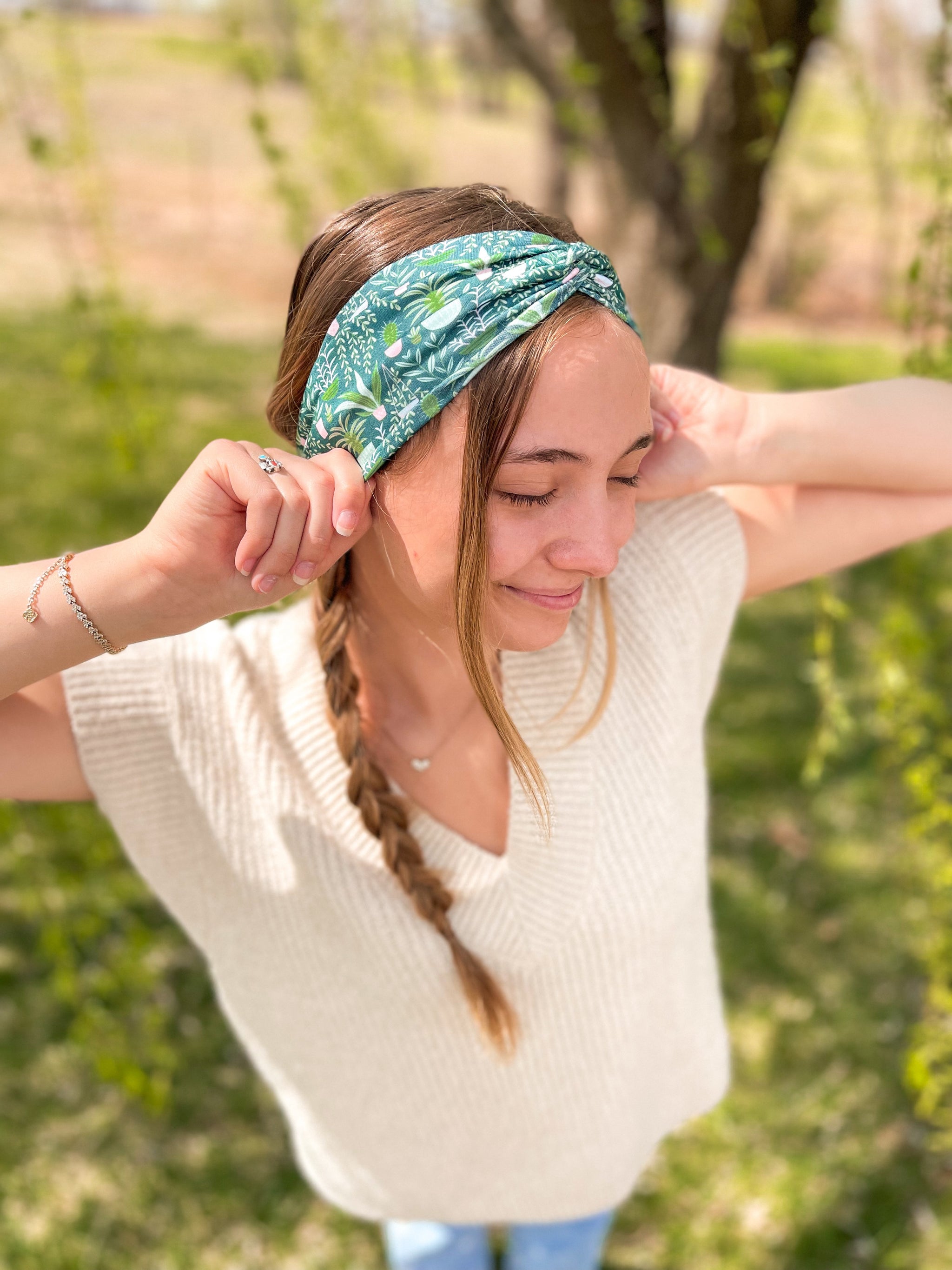 Woman confidently wearing the Grow As You Go headband for easy hairstyles and comfortable wear.