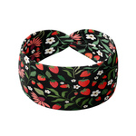 Feelin' Berry Good headband featuring red flowers and strawberries on a black background. Ultra-stretchy, non-slip, and machine washable for versatile wear.