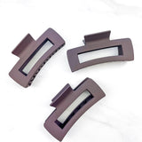 Hair claw clip in white, mocha or black in a rectangle shape