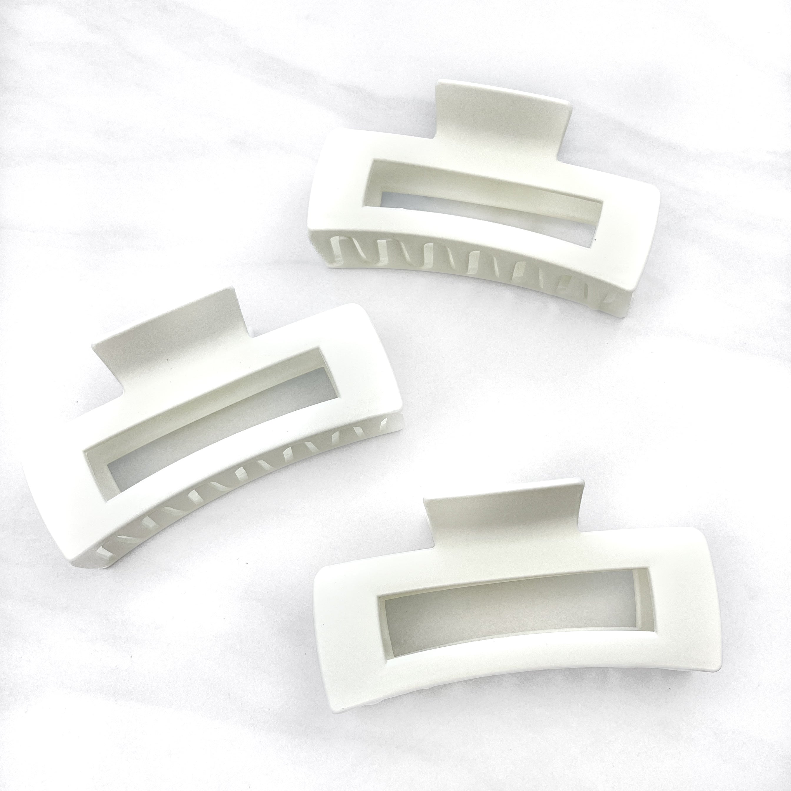 Hair claw clip in white, mocha or black in a rectangle shape