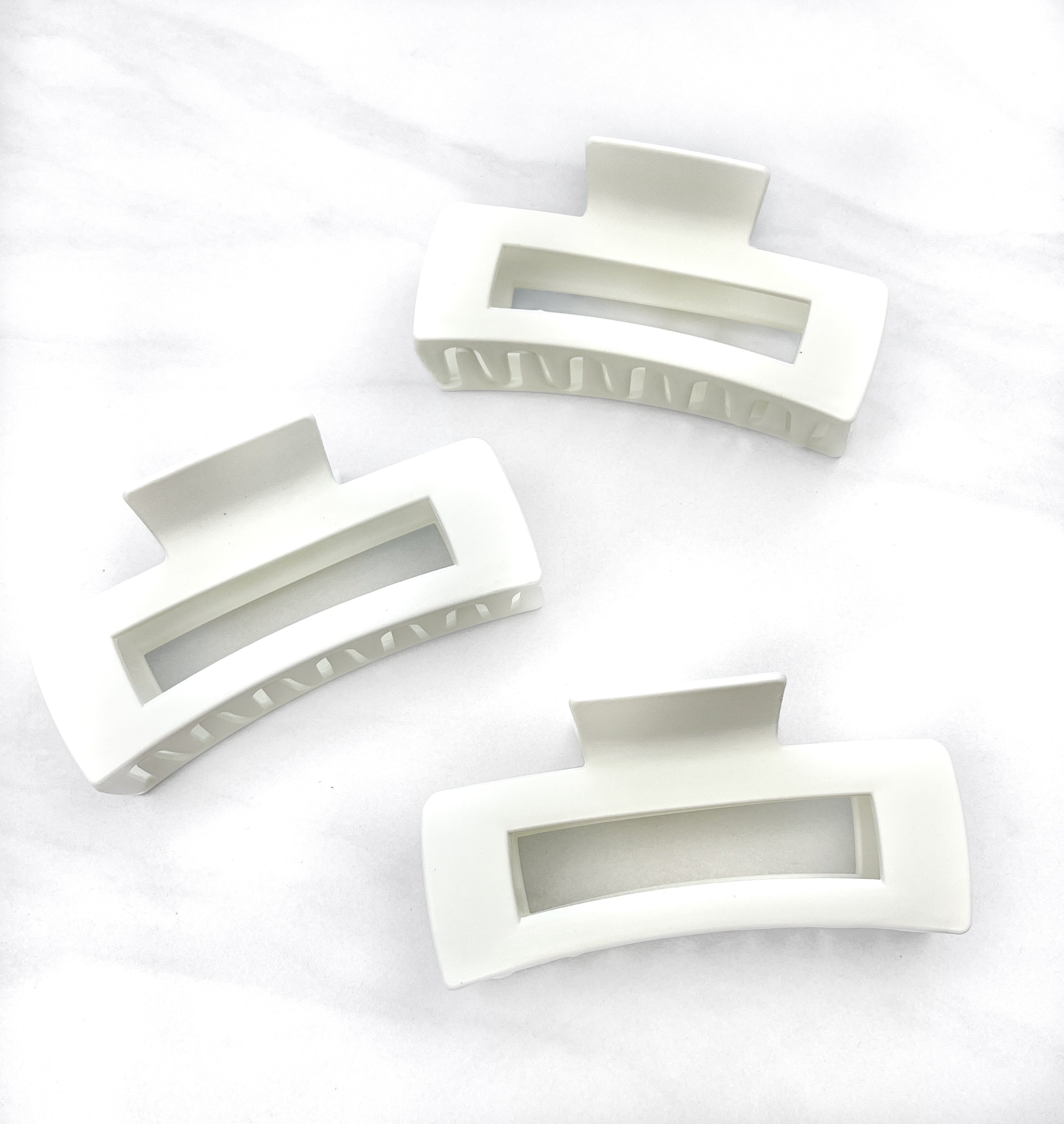 Hair claw clip in white, mocha or black in a rectangle shape