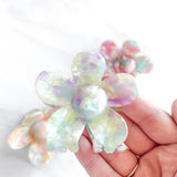 Hair claw clip in pink, yellow, or green marble in a flower shape