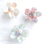 Hair claw clip in pink, yellow, or green marble in a flower shape