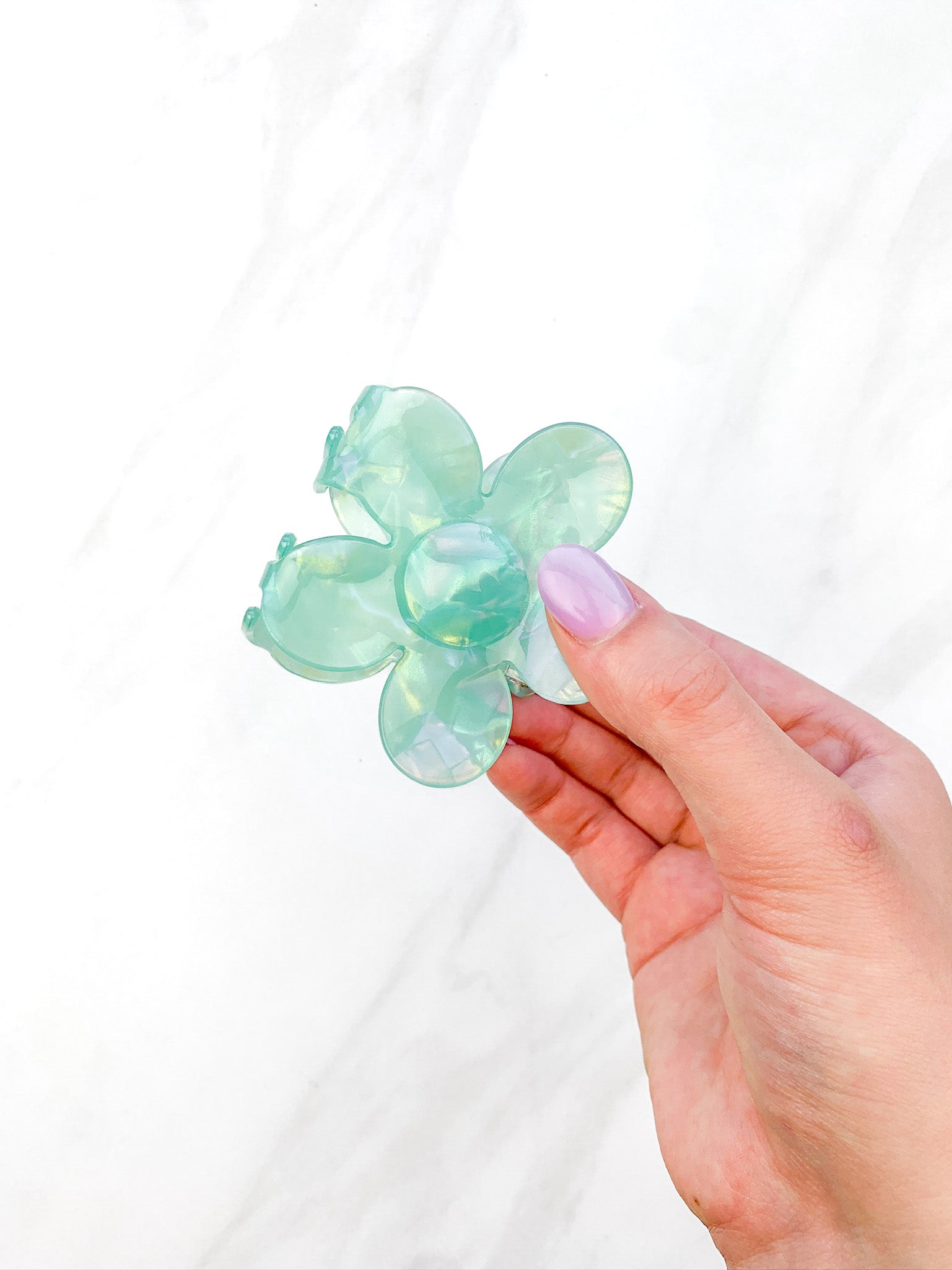 Hair claw clip in pink, yellow, or green marble in a flower shape