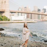 Woman wearing Unconditional headband from The Sarah Wallace Collection. Headband is versatile, non-slip, and sweat absorbent, perfect for various activities.