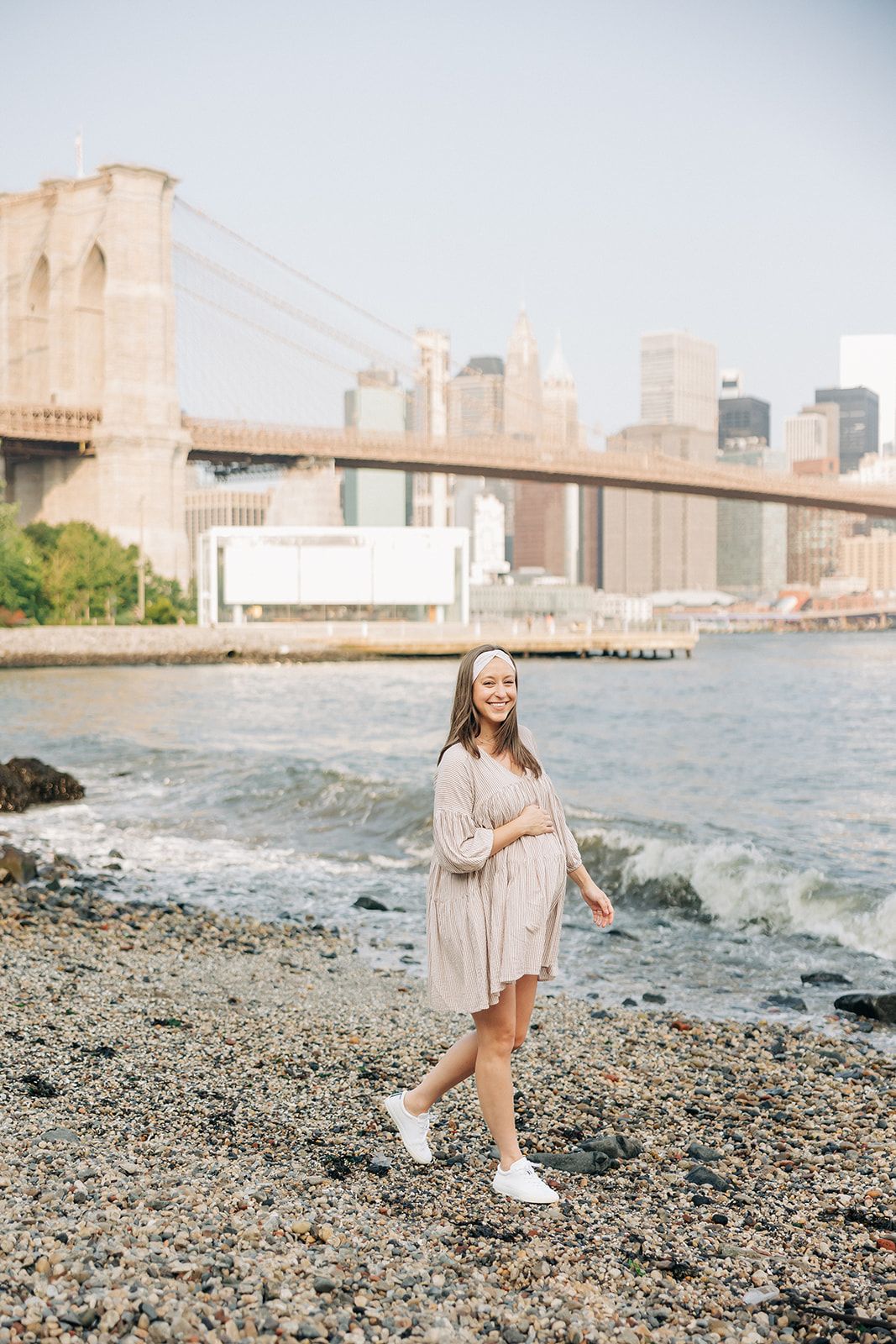 Woman wearing Unconditional headband from The Sarah Wallace Collection. Headband is versatile, non-slip, and sweat absorbent, perfect for various activities.