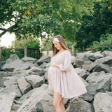 Woman smiling, wearing a Fortitude headband, showcasing its functional, versatile design. The headband is non-slip, sweat-absorbent, and perfect for workouts or daily wear.