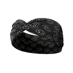 A black headband with white smiley faces, providing confidence and functionality. Perfect for workouts, shifts, or play days.