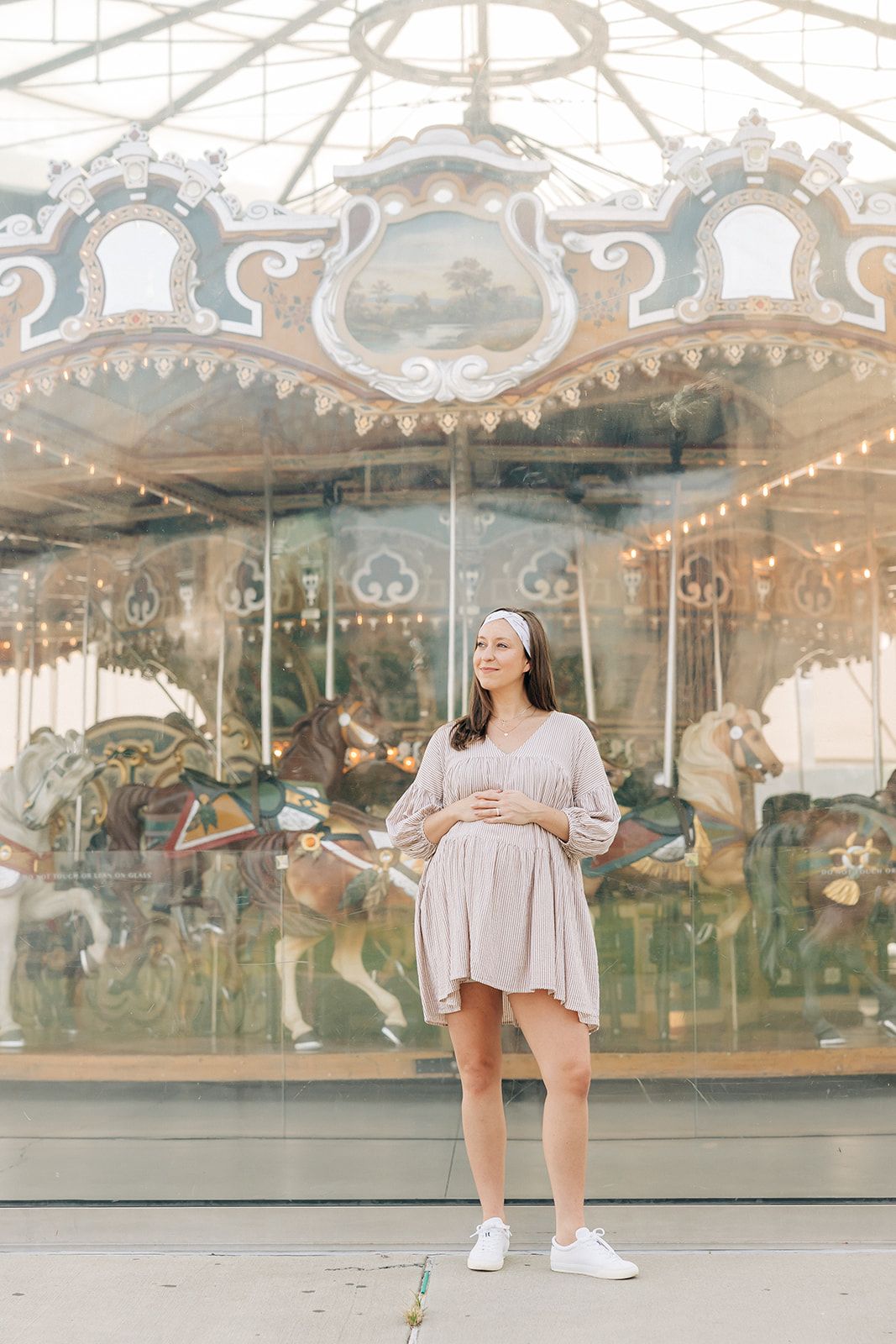 Woman smiling, wearing The Corey headband, a versatile and functional poly-knit blend from The Sarah Wallace Collection, the perfect accessory for easy hairstyles.