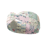 Patchwork headband featuring white, sage, peach and pink patchwork quilt designs, crafted from a buttery-soft, ultra-stretchy poly-knit blend, designed for reliable non-slip comfort.