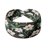 A black headband with white floral pattern and "Mama" script, offering confidence and functionality. Features one size fits most, machine washable, ultra stretchy poly-knit blend, versatile 3-in-1 twist style, sweat absorbent double-layer fabric.