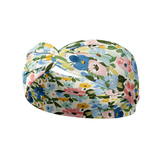 Hope Floral on Ivory headband featuring hand-drawn blue, pink, orange and green flowers, crafted from a buttery-soft, ultra-stretchy poly-knit blend, designed for versatility and comfort.