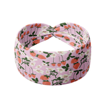 You Pick 'Em pink headband featuring blooming strawberry plants, crafted from a buttery-soft, ultra-stretchy poly-knit blend, designed for reliable non-slip comfort.